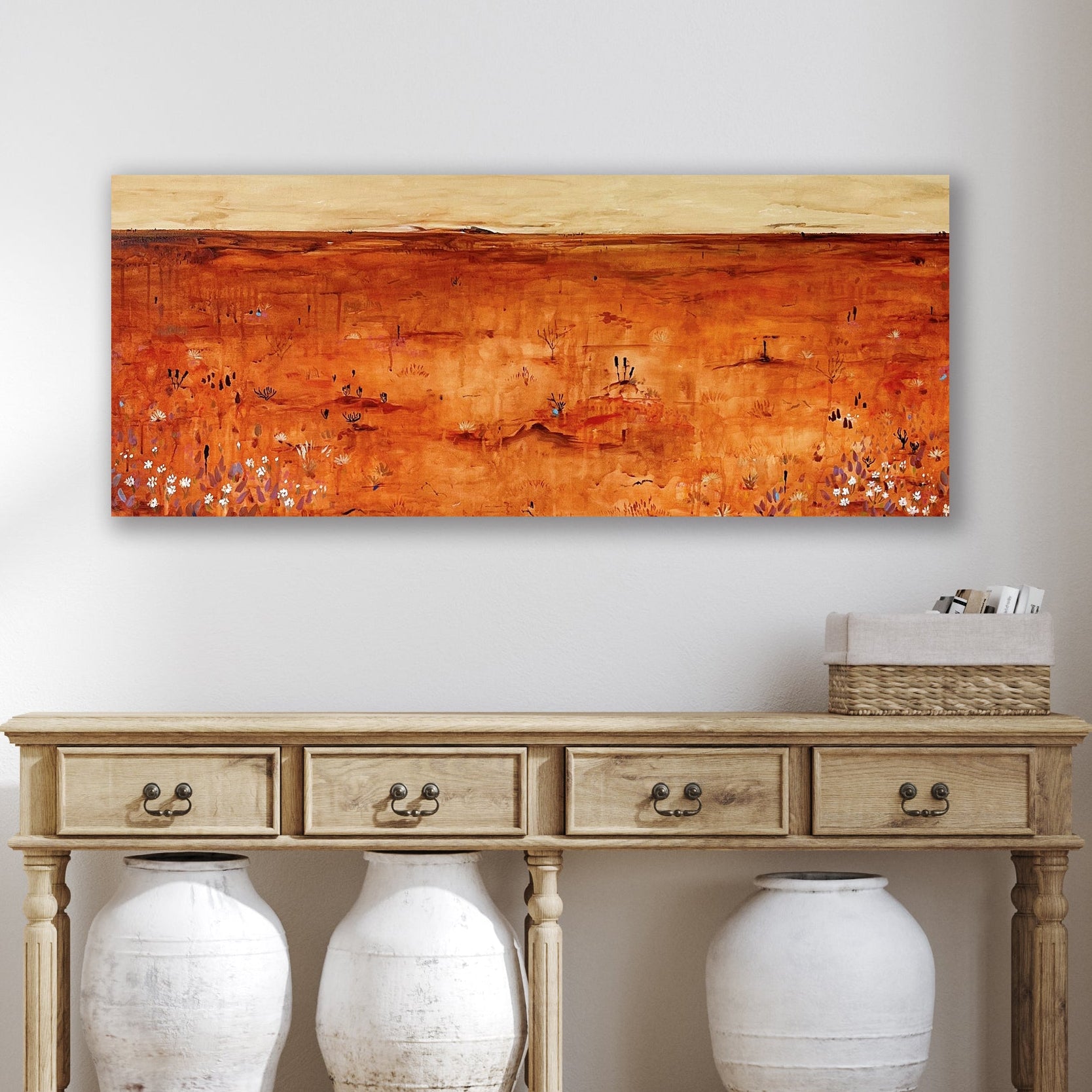 The Vast Between abstract landscape painting displayed in a home interior