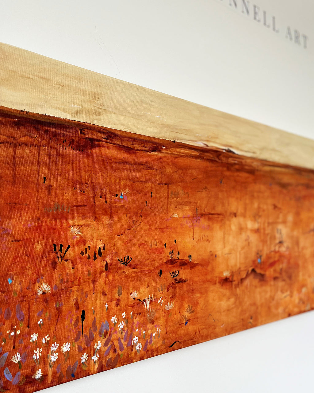 Close-up detail of The Vast Between showing layered acrylic brushwork and tonal depth